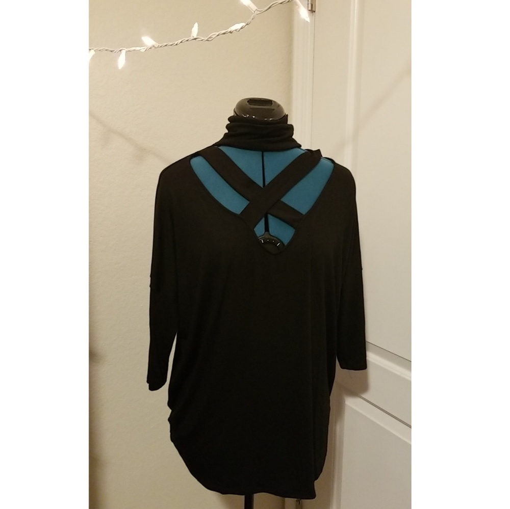 Criss-crossed mock neck top